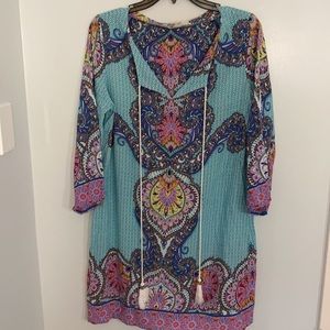 Entro dress or swim cover up. Long tassels and three quarter length sleeves.